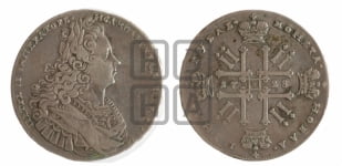 Рубль 1728 года (голова разделяет надпись, в венке бант)