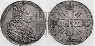 Рубль 1728 года (голова разделяет надпись, в венке бант)