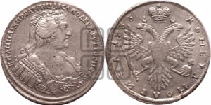 Полтина 1733 года (голова меньше, ближе к центру)