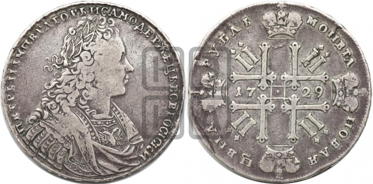Рубль 1729 года (голова внутри надписи, без звезды на груди, в венке ленты)