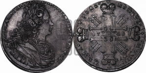 Рубль 1728 года (голова разделяет надпись, в венке бант)