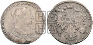 Рубль 1734 года (голова меньше, крест короны делит надпись, одинарная складка над корсажем)