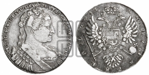 Рубль 1734 года (Большая голова, крест короны делит надпись, тройная складка над корсажем)