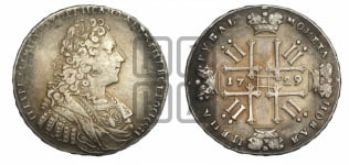 Рубль 1729 года (голова внутри надписи, со звездой на груди, в венке ленты)