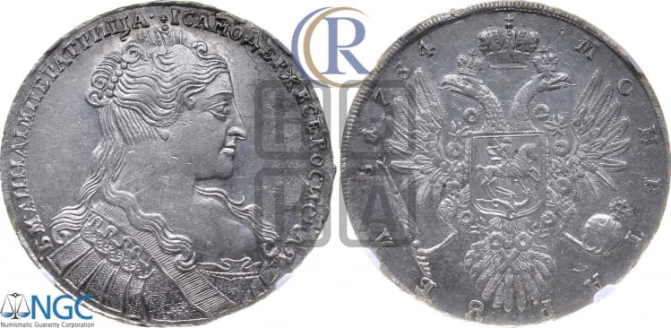 Рубль 1734 года (голова меньше, крест короны делит надпись, одинарная складка над корсажем)