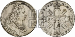 Рубль 1728 года (голова разделяет надпись, в венке бант)
