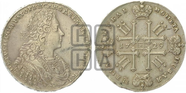 Рубль 1729 года (голова внутри надписи, со звездой на груди, в венке ленты)