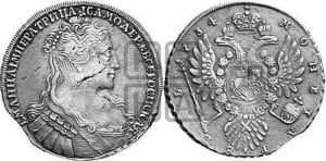 Рубль 1734 года (Большая голова, крест короны делит надпись, тройная складка над корсажем)