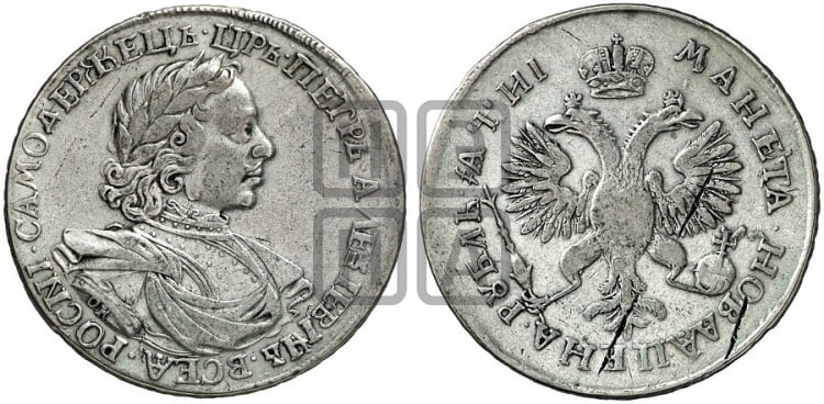 1 рубль 1718 года (портрет в латах, знак медальера ОК, инициалы минцмейстера L)