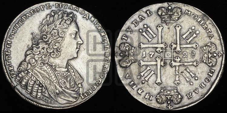 Рубль 1728 года (голова внутри надписи, со звездой на плаще)