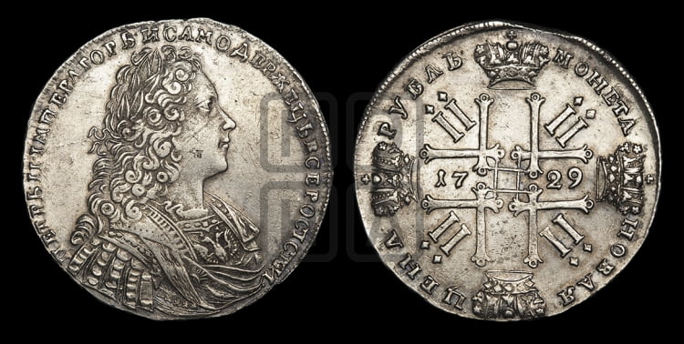 Рубль 1729 года (голова внутри надписи, со звездой на груди, в венке ленты)
