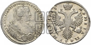 Полтина 1733 года (голова меньше, ближе к центру)